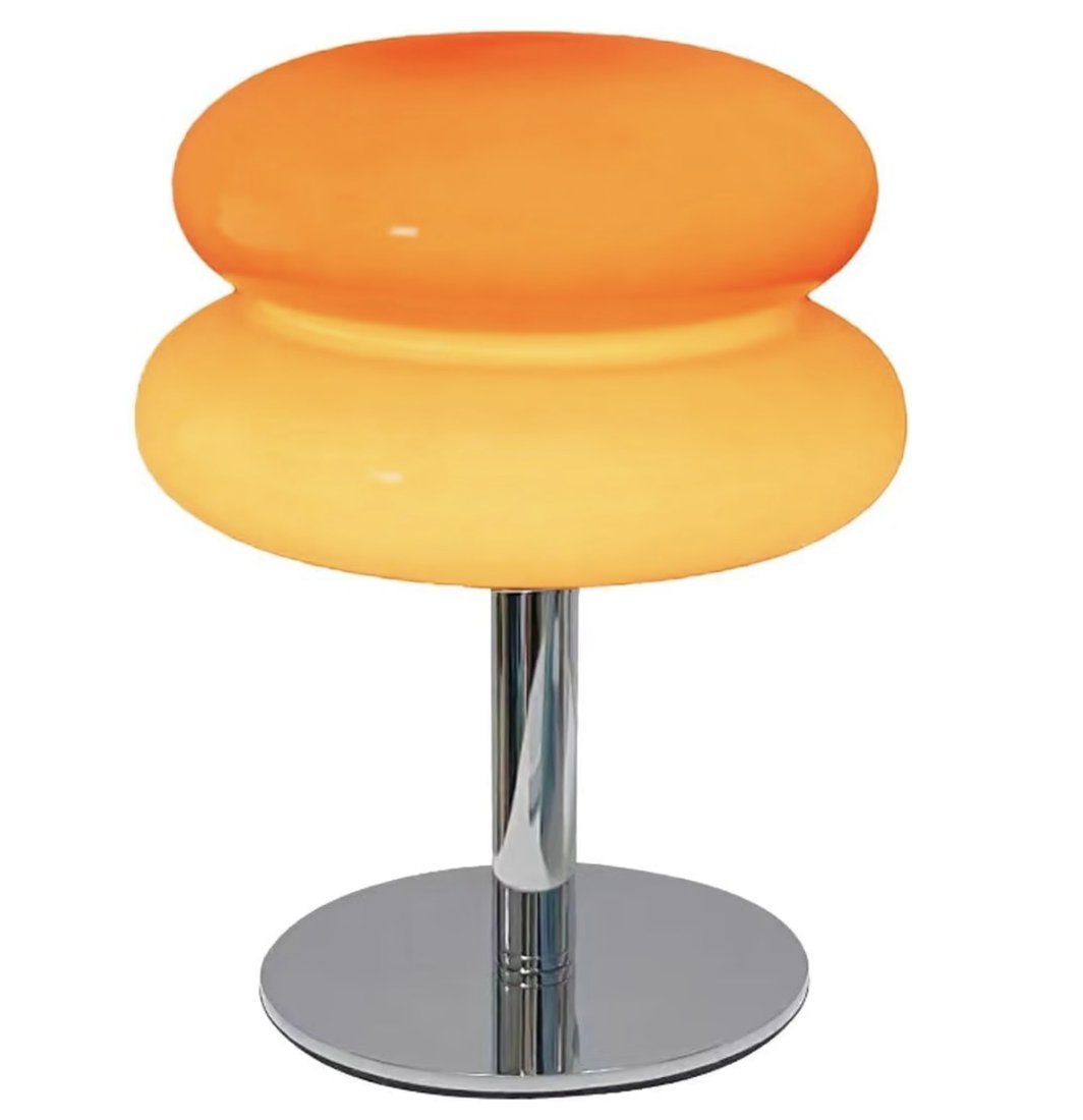 Lámpara de mesa donut sobre pedestal